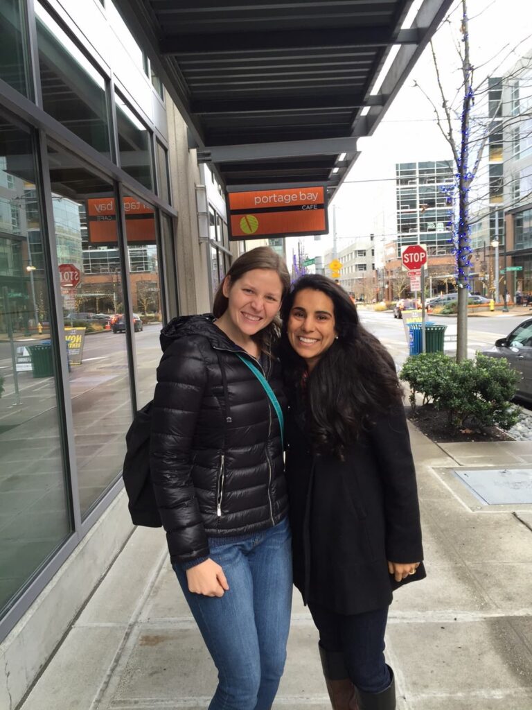 Two best friends on a sidewalk smiling for the camera - Choosing to pursue meaningful friendships even when it feels uncomfortable